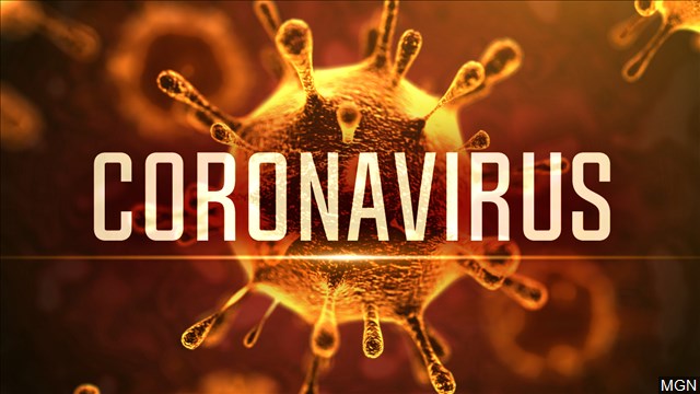 Coronavirus in Bold Capital Letters with a virus spore in the background. Photo by Alpha Media USA Portland OR