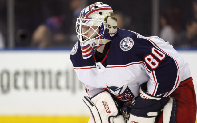 FILE - Columbus Blue Jackets goaltender Matiss Kivlenieks (80) is shown during the second period of an NHL hockey game in New York, in this Sunday, Jan. 19, 2020, file photo. The Columbus Blue Jackets and Latvian Hockey Federation said Monday, July 5, 2021, that 24-year-old goaltender Matiss Kivlenieks has died. A medical examiner in Michigan says an autopsy has determined he died of chest trauma from an errant fireworks mortar blast. Police in Novi, Michigan, said the mortar-style firework tilted slightly and struck Kivlenieks while he was in a hot tub.
