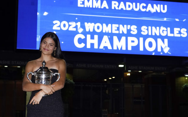 Emma Raducanu, of Britain, poses outside Arthur Ashe Stadium with the championship trophy after she defeated Leylah Fernandez, of Canada, in the women's singles final of the US Open tennis championships, Saturday, Sept. 11, 2021, in New York. (AP Photo/Elise Amendola) Sept 28th 2021 @ap.images