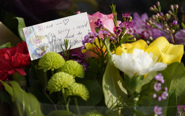 A note is among flowers and candles that were placed outside Croft House store in honor of Brianna Kupfer on Tuesday, Jan. 18, 2022, in Los Angeles. The Los Angeles Police Department, West Bureau Homicide detectives are investigating the murder of Kupfer, a 24-year-old Pacific Palisades resident, who was killed at a business in the 300 block of North La Brea Avenue on Jan. 13. (AP Photo/Ashley Landis) used locally Jan 19th 2022. @ap.images