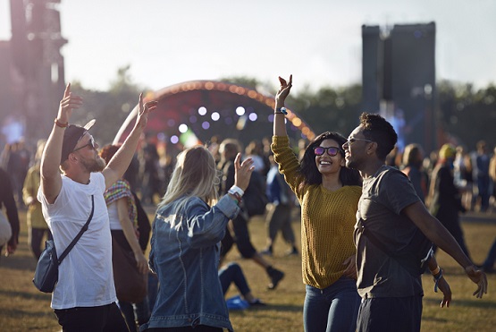 People dancing at a music festival Photo from Getty Images via Alpha Media Portland OR
