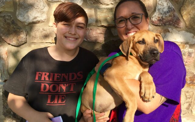 New pet owners adopting a dog from the Riverside County Animal Shelter. Photo from Riverside County Animal Services Department